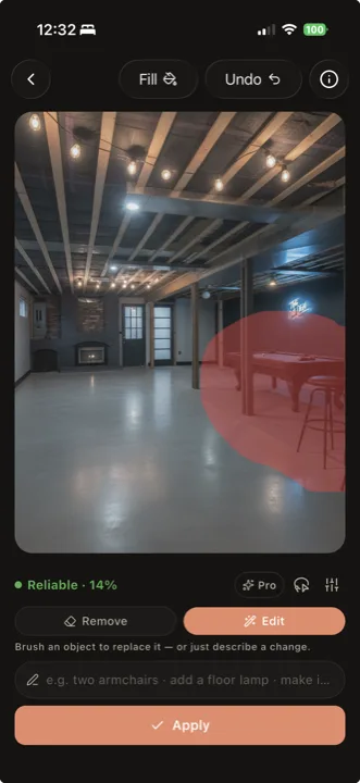 AI touch-up editor with a brush selection over an object being removed from a room